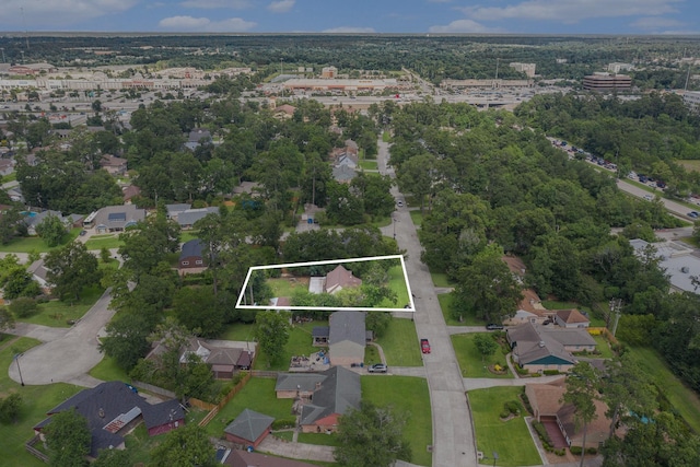 306 Hickory Ridge Dr, Shenandoah, TX 77381 - aerial overview of property's location with property parcel outlined and nearby suburban area