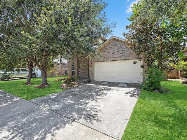 4315 Countrycrossing Dr, Spring, TX 77388 - obstructed view of property featuring an attached garage, a front yard, driveway, and brick siding