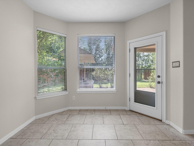 4315 Countrycrossing Dr, Spring, TX 77388 - entryway with plenty of natural light and light tile patterned floors