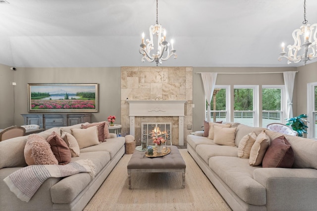 1518 Honea Egypt Rd, Magnolia, TX 77354 - living area with a chandelier, a tiled fireplace, and vaulted ceiling