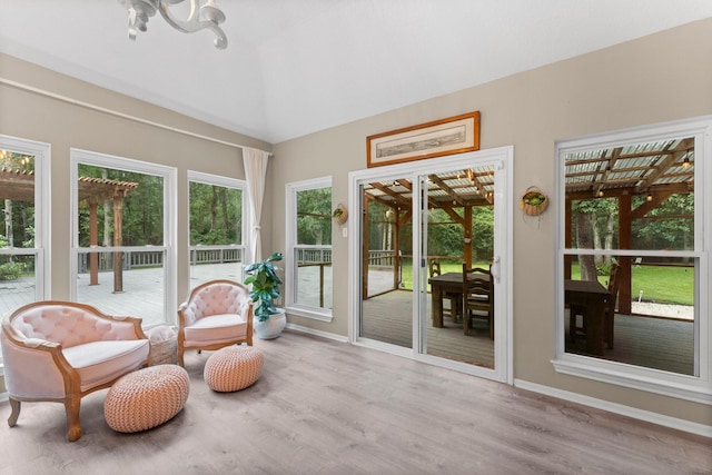 1518 Honea Egypt Rd, Magnolia, TX 77354 - sunroom featuring baseboards and wood finished floors