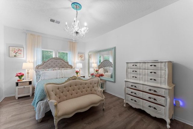 1518 Honea Egypt Rd, Magnolia, TX 77354 - bedroom featuring a chandelier and wood finished floors