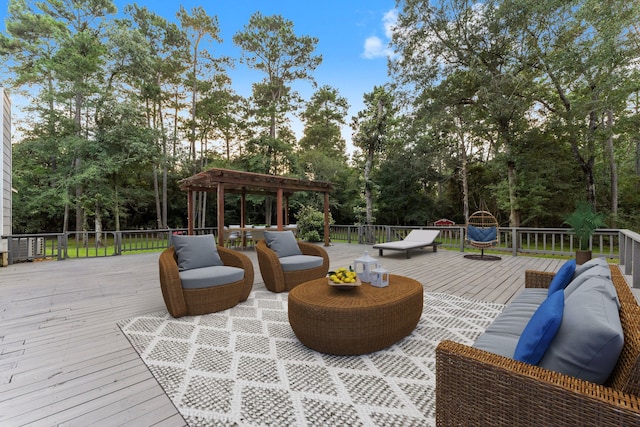 1518 Honea Egypt Rd, Magnolia, TX 77354 - wooden terrace featuring view of wooded area and an outdoor living space