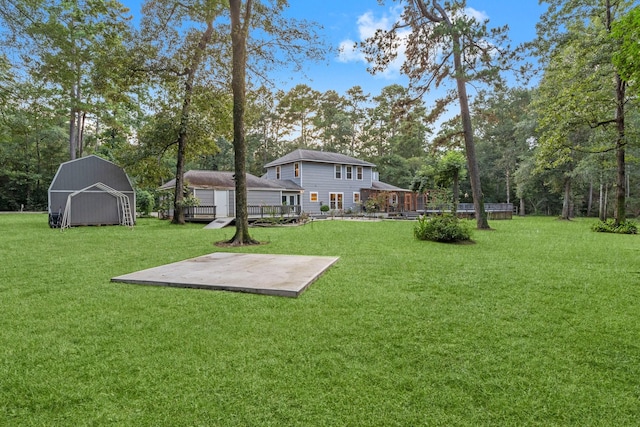 1518 Honea Egypt Rd, Magnolia, TX 77354 - view of green lawn featuring a storage unit, a patio, and view of wooded area