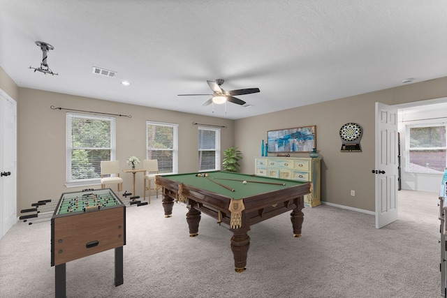 1518 Honea Egypt Rd, Magnolia, TX 77354 - game room featuring light carpet, ceiling fan, and healthy amount of natural light
