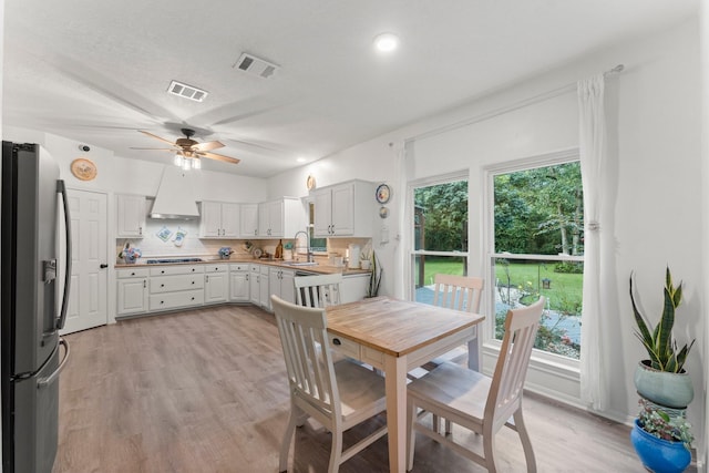 1518 Honea Egypt Rd, Magnolia, TX 77354 - dining space featuring ceiling fan and light wood-style floors