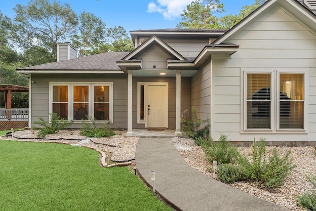 1518 Honea Egypt Rd, Magnolia, TX 77354 - view of front facade with a chimney, roof with shingles, and a front yard