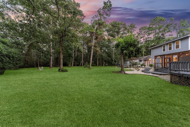 1518 Honea Egypt Rd, Magnolia, TX 77354 - view of grassy yard with a deck