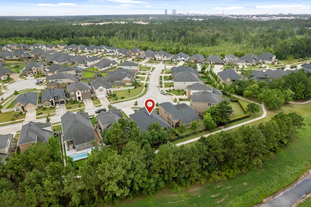 10005 Red Beadtree Pl, Conroe, TX 77385 - aerial view of property and surrounding area featuring nearby suburban area