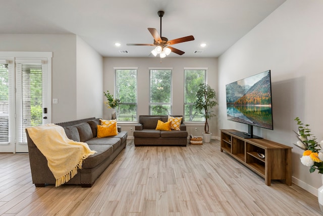 10005 Red Beadtree Pl, Conroe, TX 77385 - living room with ceiling fan, light wood-style flooring, and recessed lighting
