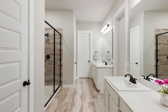 10005 Red Beadtree Pl, Conroe, TX 77385 - full bath with a shower stall and two vanities