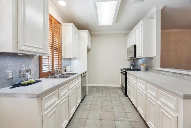 1606 Sutton St, Houston, TX 77006 - kitchen with stainless steel appliances, light countertops, decorative backsplash, white cabinetry, and crown molding
