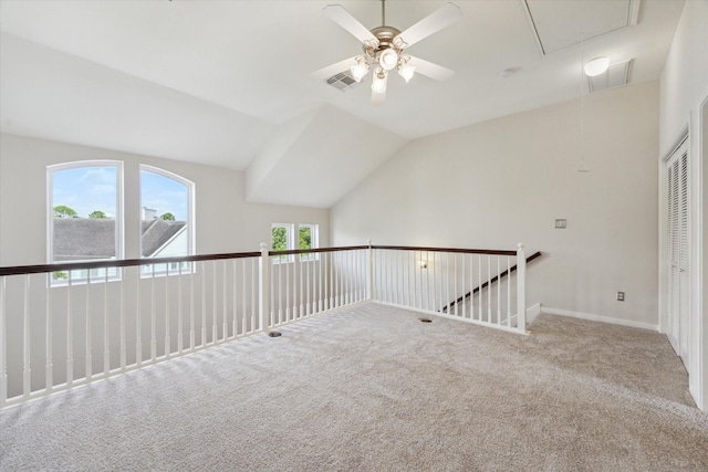 1606 Sutton St, Houston, TX 77006 - carpeted empty room with attic access, a ceiling fan, and vaulted ceiling