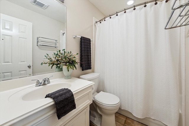 1606 Sutton St, Houston, TX 77006 - full bathroom featuring vanity, tile patterned flooring, and shower / bath combo with shower curtain