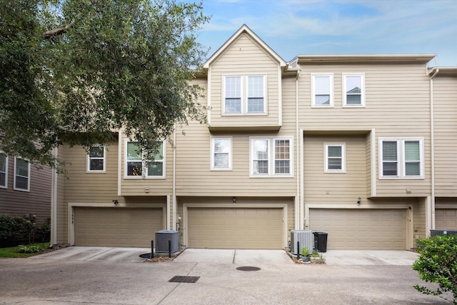 1606 Sutton St, Houston, TX 77006 - view of front of house featuring a garage and driveway