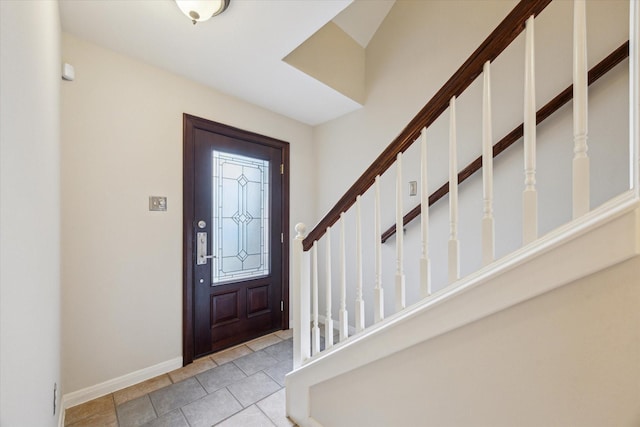 1606 Sutton St, Houston, TX 77006 - foyer featuring baseboards and tile patterned floors