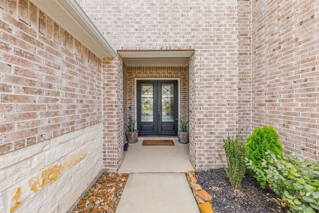 3239 Caney Dr, Katy, TX 77493 - property entrance featuring french doors and brick siding