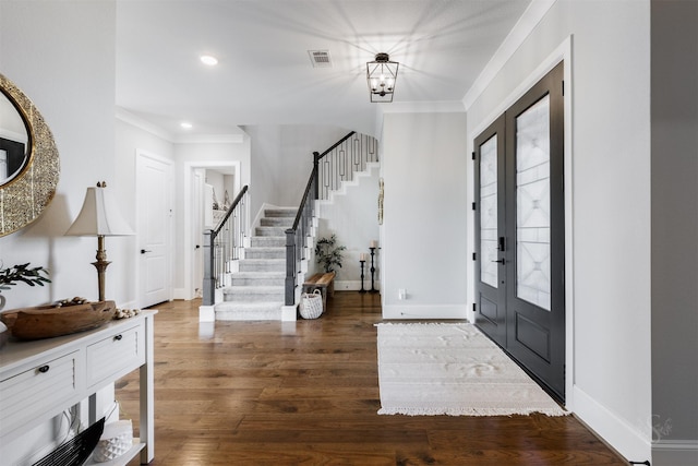 3239 Caney Dr, Katy, TX 77493 - entrance foyer featuring stairway, ornamental molding, wood finished floors, recessed lighting, and a chandelier
