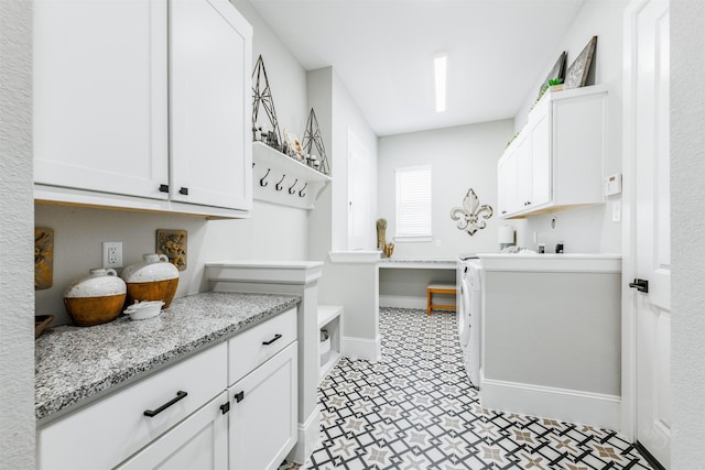 3239 Caney Dr, Katy, TX 77493 - laundry room featuring cabinet space and light floors