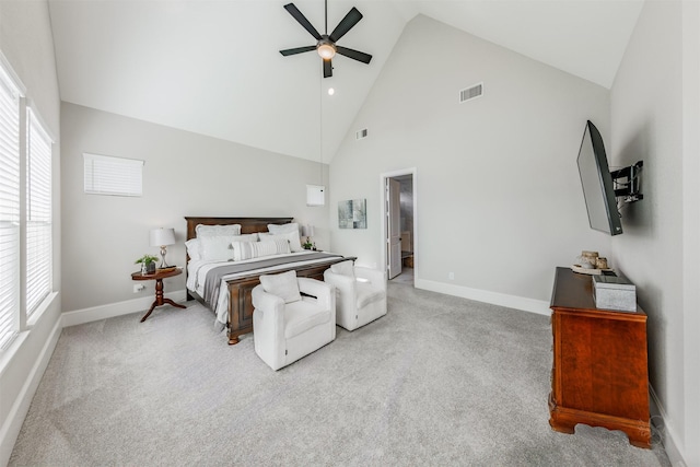 3239 Caney Dr, Katy, TX 77493 - carpeted bedroom featuring high vaulted ceiling, multiple windows, and a ceiling fan