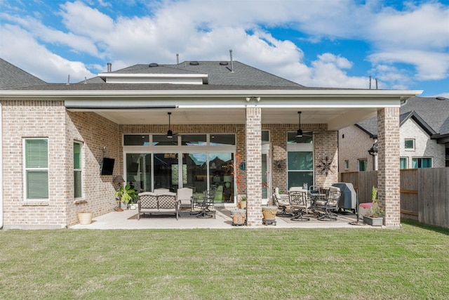 3239 Caney Dr, Katy, TX 77493 - back of house featuring ceiling fan, a patio area, and brick siding