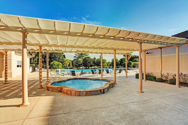 1607 N Primavera Dr, Pearland, TX 77581 - community pool featuring a pergola, a community hot tub, and a patio