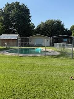 701 Lee Ave, Anahuac, TX 77514 - view of pool featuring an outdoor structure