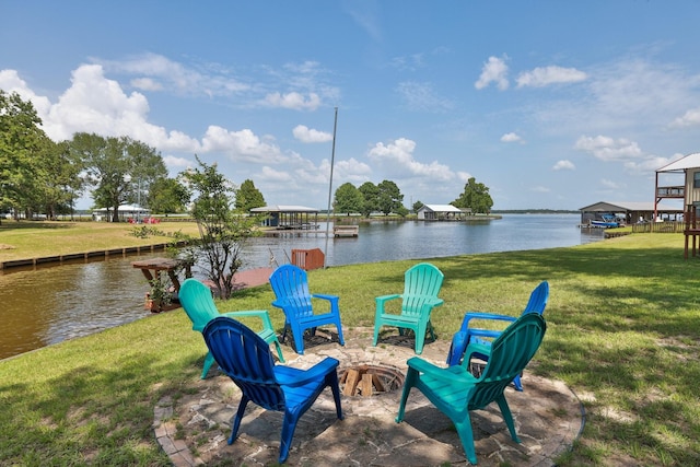 20559 Red Bud Ct, Thornton, TX 76687 - view of green lawn with a fire pit and a water view