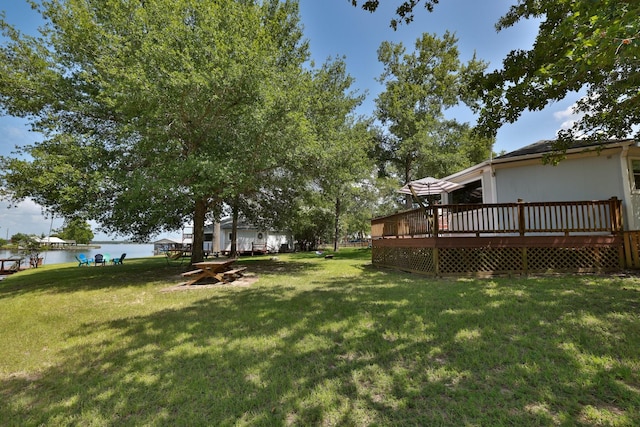20559 Red Bud Ct, Thornton, TX 76687 - view of grassy yard with a deck with water view
