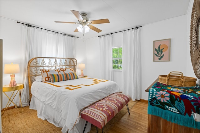 20559 Red Bud Ct, Thornton, TX 76687 - bedroom with wood finished floors and ceiling fan
