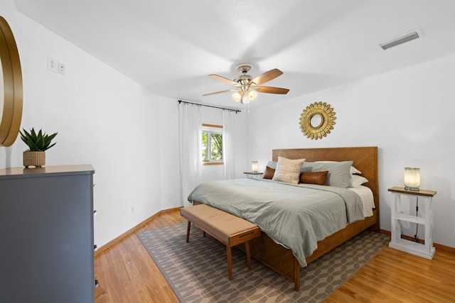 20559 Red Bud Ct, Thornton, TX 76687 - bedroom with wood finished floors and a ceiling fan