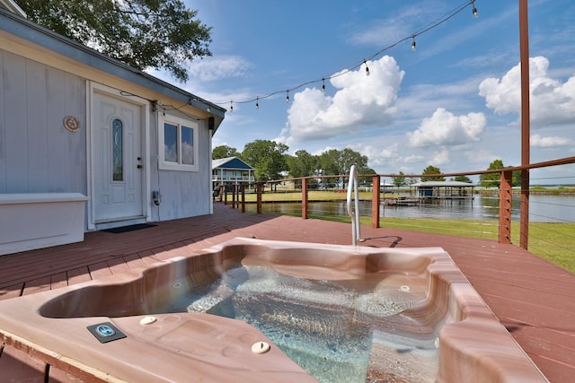 20559 Red Bud Ct, Thornton, TX 76687 - wooden deck with an outdoor hot tub and a water view