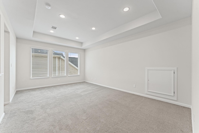 29622 Sterling Knoll Dr, Fulshear, TX 77441 - carpeted spare room featuring a tray ceiling, recessed lighting, and a smoke detector