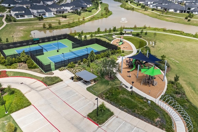 29622 Sterling Knoll Dr, Fulshear, TX 77441 - aerial view of residential area featuring a nearby body of water and a recreational park