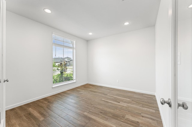 29622 Sterling Knoll Dr, Fulshear, TX 77441 - spare room featuring wood finished floors and recessed lighting