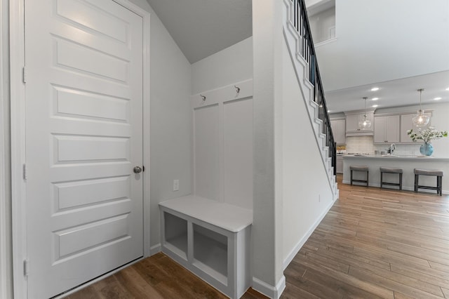 29622 Sterling Knoll Dr, Fulshear, TX 77441 - mudroom featuring wood finished floors, recessed lighting, and lofted ceiling