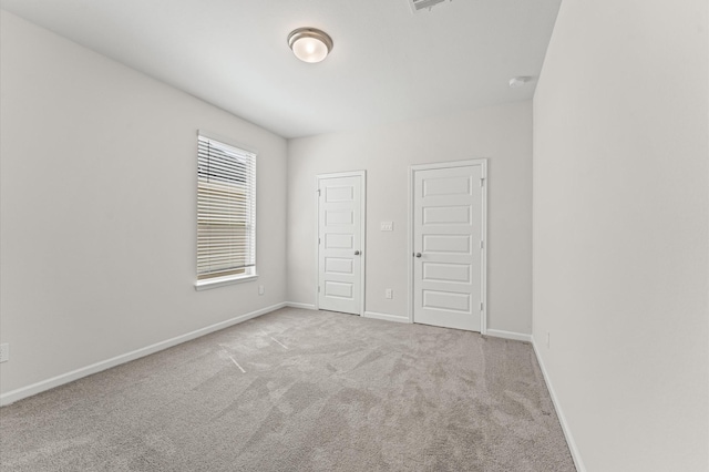 29622 Sterling Knoll Dr, Fulshear, TX 77441 - unfurnished bedroom featuring carpet flooring and baseboards