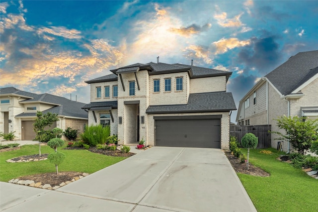 29622 Sterling Knoll Dr, Fulshear, TX 77441 - view of front of house featuring driveway, a garage, and brick siding