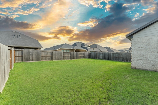 29622 Sterling Knoll Dr, Fulshear, TX 77441 - yard at dusk with a fenced backyard