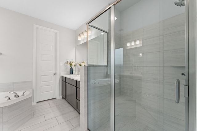 29622 Sterling Knoll Dr, Fulshear, TX 77441 - full bath featuring vanity, a shower stall, a bath, and tile patterned flooring