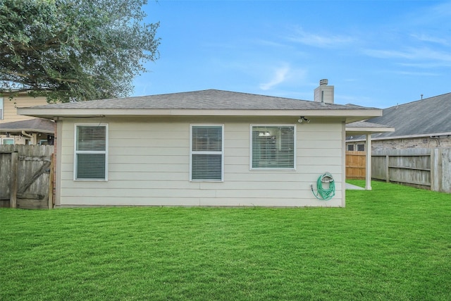 10143 Rose Willow Ln, Brookshire, TX 77423 - rear view of house with a chimney and a shingled roof