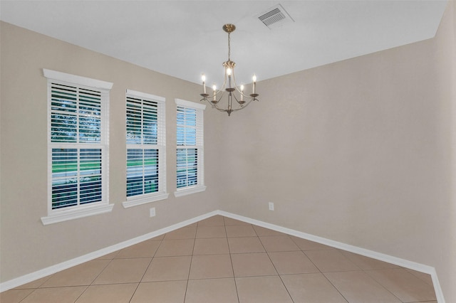 10143 Rose Willow Ln, Brookshire, TX 77423 - empty room with a chandelier and light tile patterned flooring