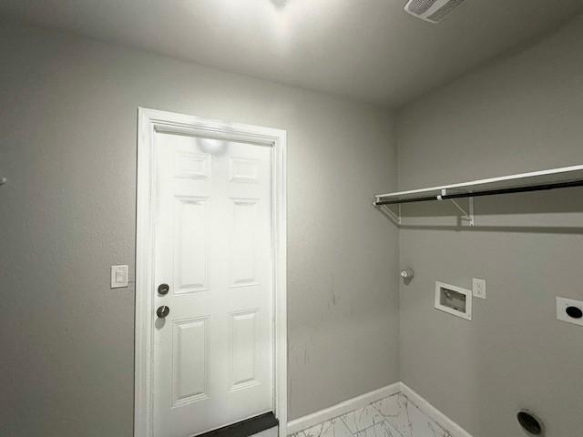 9013 Lugary Dr, Houston, TX 77074 - laundry area featuring electric dryer hookup, hookup for a gas dryer, light marble finish floors, and hookup for a washing machine