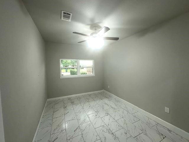 9013 Lugary Dr, Houston, TX 77074 - unfurnished room featuring marble finish floors and a ceiling fan