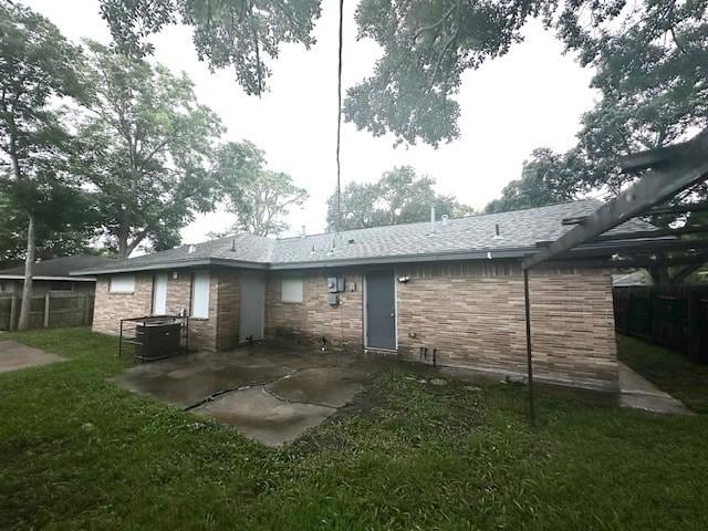 9013 Lugary Dr, Houston, TX 77074 - rear view of property with a patio
