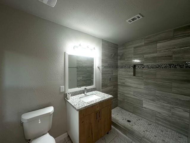 9013 Lugary Dr, Houston, TX 77074 - full bathroom featuring vanity, marble finish flooring, and tiled shower