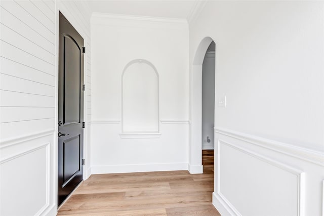 5406 Darling St Unit A, Houston, TX 77007 - hall with light wood-style floors, arched walkways, and crown molding