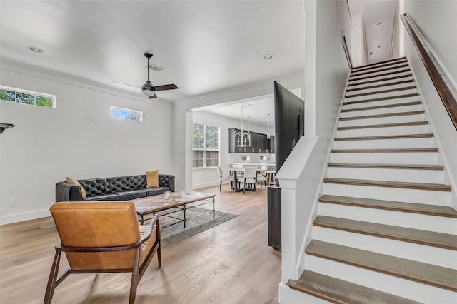 5406 Darling St Unit A, Houston, TX 77007 - living area with ceiling fan, stairway, light wood-type flooring, crown molding, and recessed lighting
