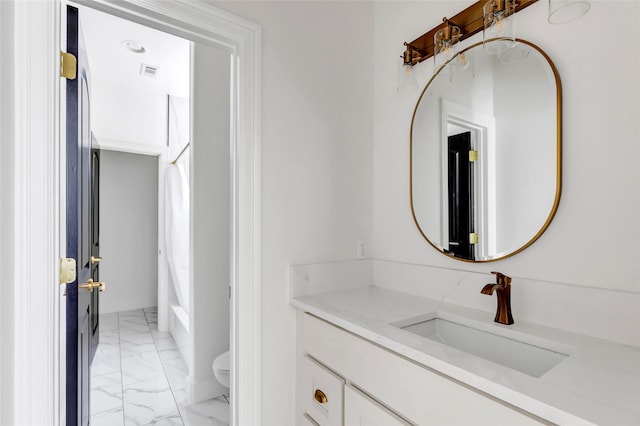 5406 Darling St Unit A, Houston, TX 77007 - bathroom with marble look tiles and vanity