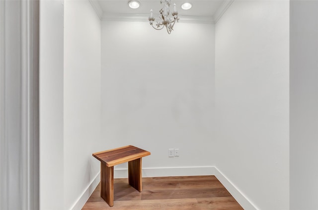 5406 Darling St Unit A, Houston, TX 77007 - empty room featuring crown molding, a chandelier, and wood finished floors